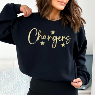 Person wearing a black sweatshirt with 'Chargers' printed in gold.