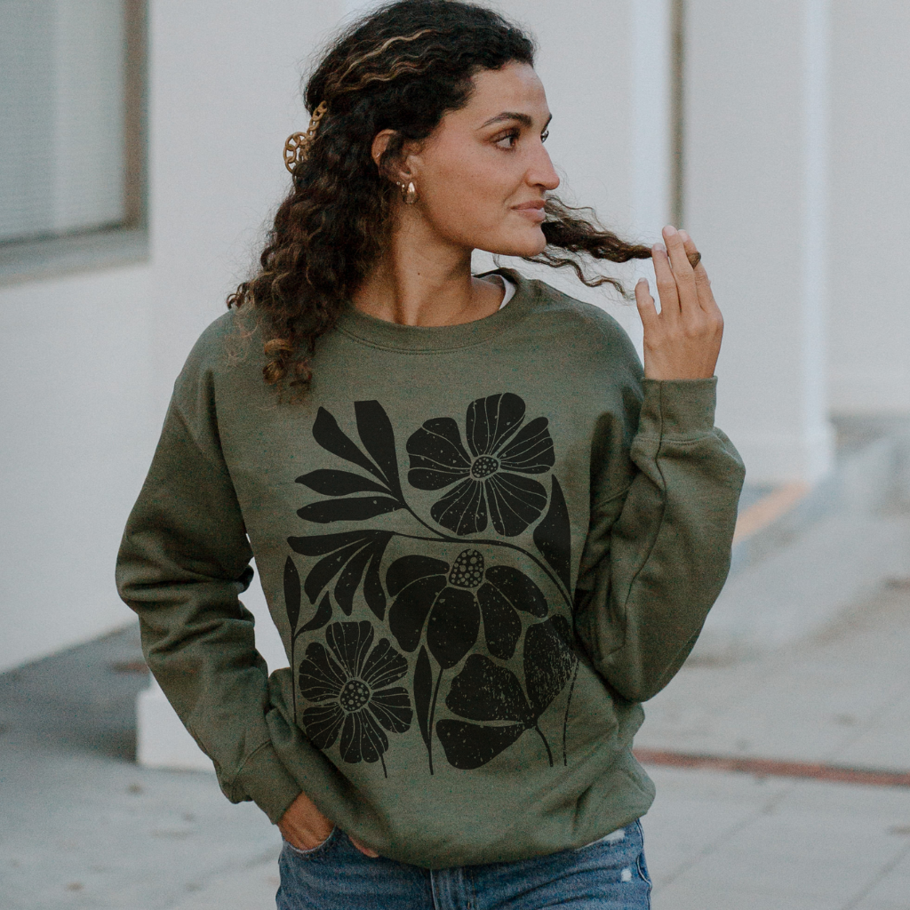 Black Floral Women&#39;s Sweatshirt, cozy unisex fleece crewneck with a stylish floral graphic design, perfect for casual wear or layering, available at Melody Faye.