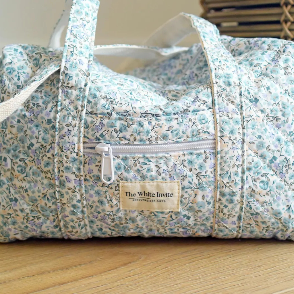 Embroidered Quilted Tote Bag, Monogrammed Duffle Bag with Floral Design, perfect as an overnight bag with a zipper, stylish and functional for travel, gym, or everyday use, available at Melody Faye.