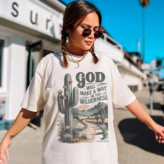 Woman wearing God Will Make A Way In The Wilderness Christian Graphic Tee