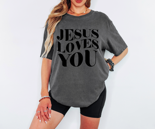 Faith-based graphic t-shirt with large Jesus Loves You typography