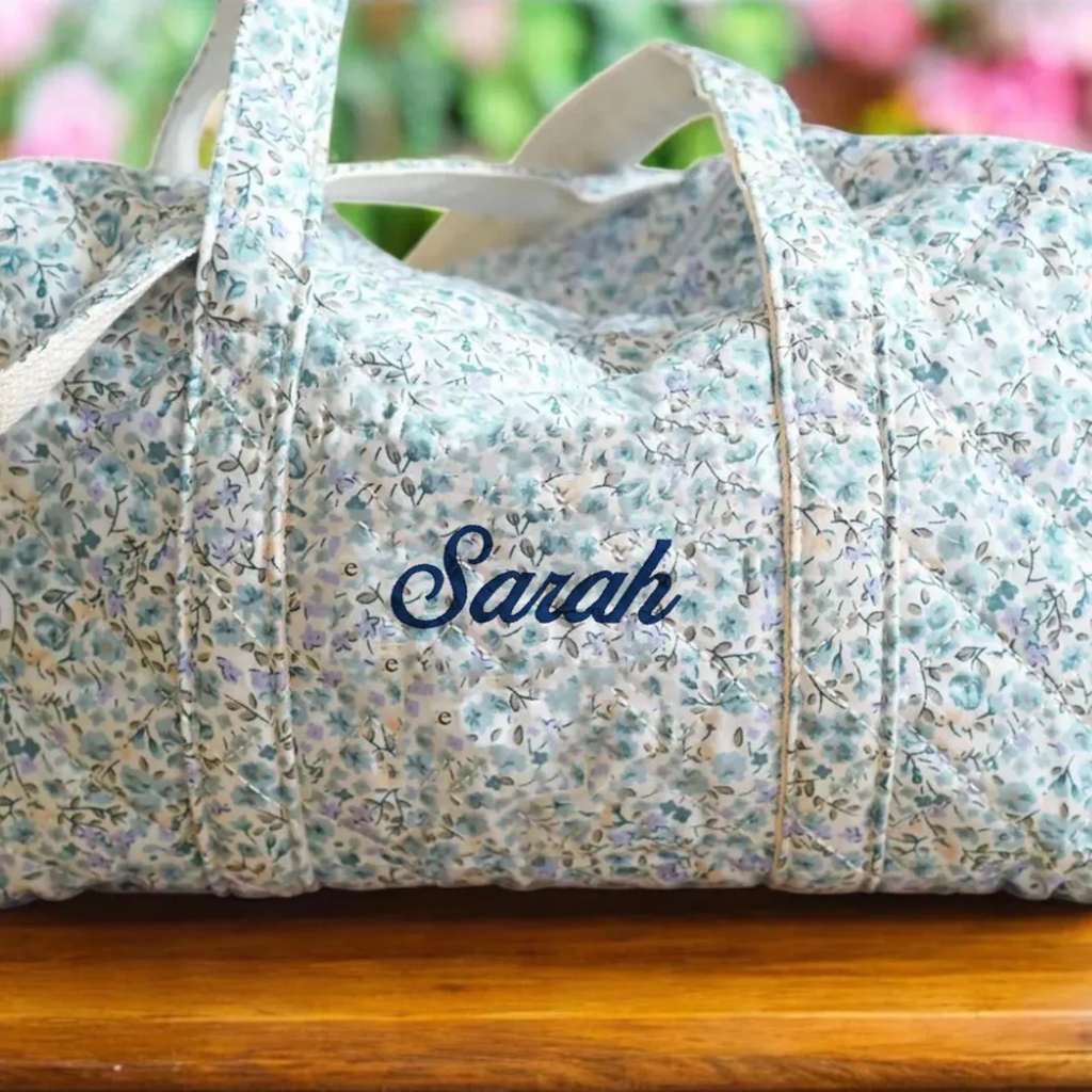 Embroidered Quilted Tote Bag, Monogrammed Duffle Bag with Floral Design, perfect as an overnight bag with a zipper, stylish and functional for travel, gym, or everyday use, available at Melody Faye.