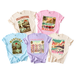 Five t-shirts with different designs and colors on a white background