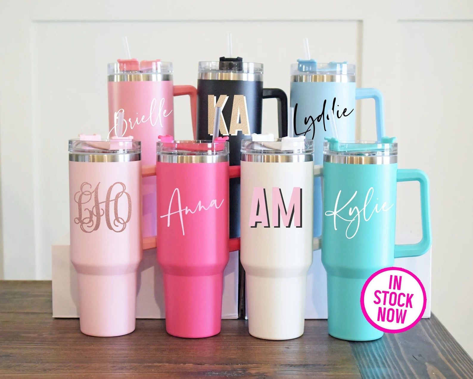 40 oz Tumbler with Handle, personalized with a name or design, and includes a straw. This large, durable tumbler is perfect for keeping drinks at the ideal temperature, featuring a convenient handle and customizable exterior.