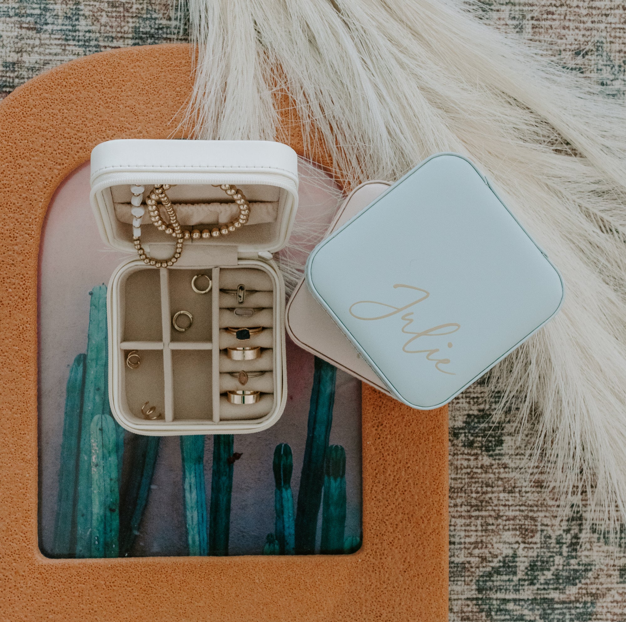 Ideal gift for bridesmaids, perfect for storing jewelry while on the go, and can be personalized with names or monograms.